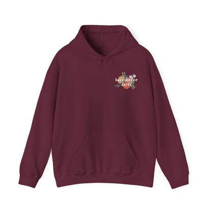LOVE NEVER FAILS HOODIE