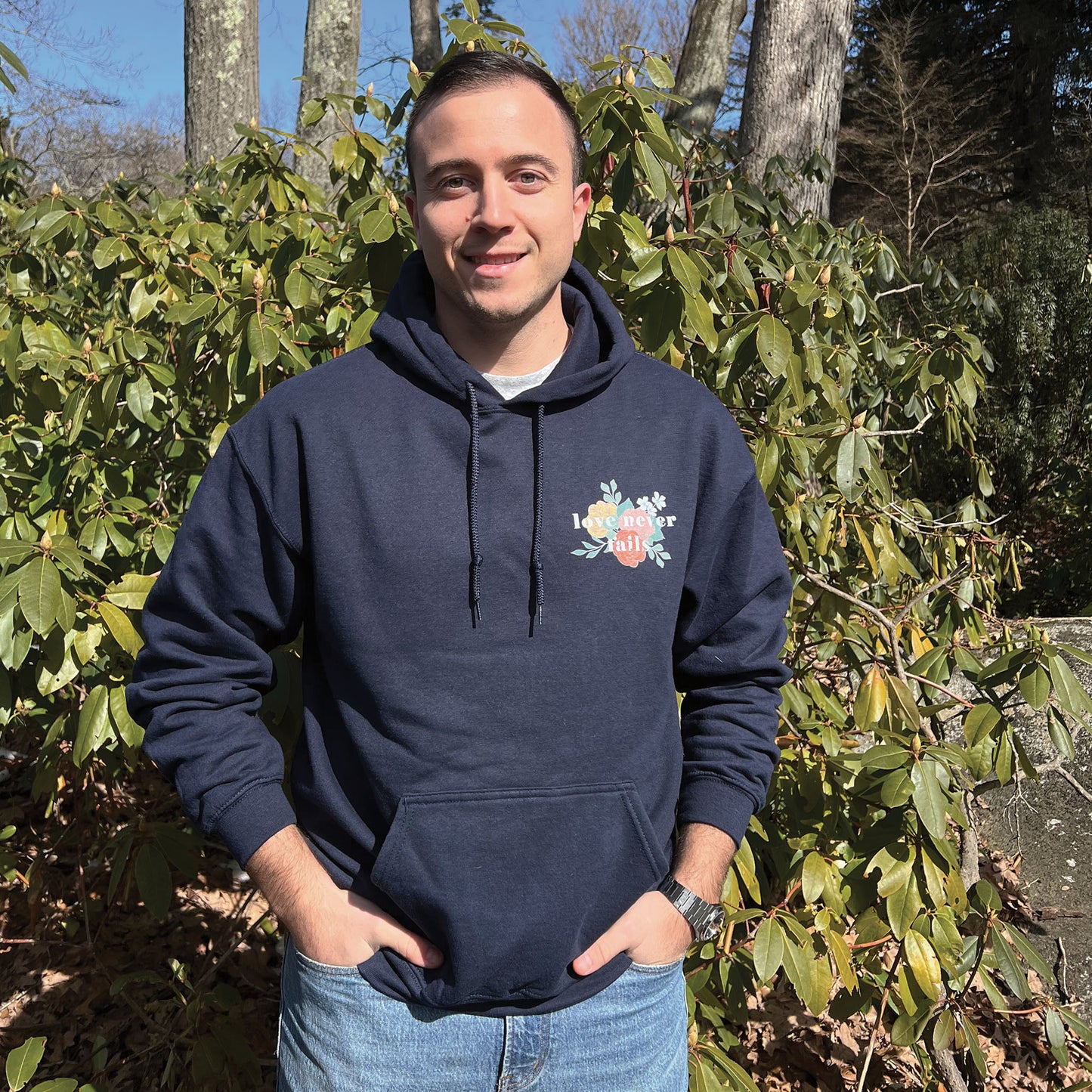 LOVE NEVER FAILS HOODIE